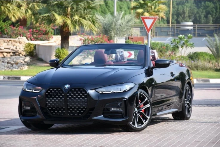 BMW 420 I Convertible 2024 BLACK RENTAL IN DUBAI - undefined